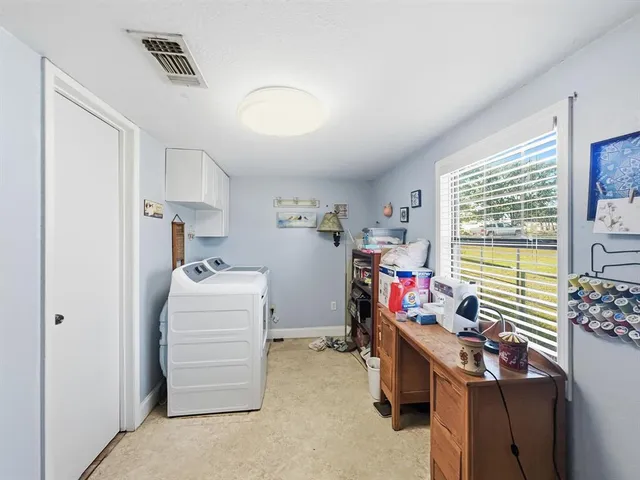 a view of a house with a big yard