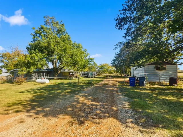 a view of a swimming pool with an outdoor space and seating area