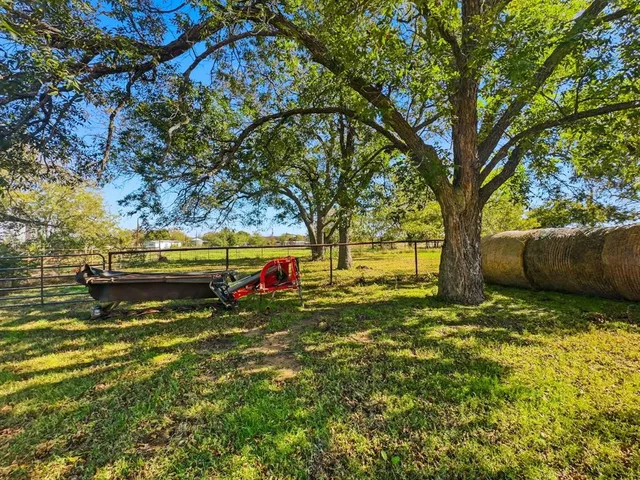 a house with trees in the background