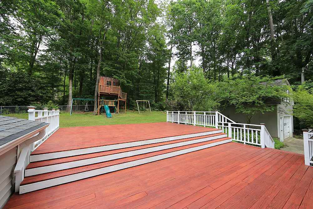 6004 Spring Valley Drive Raleigh, NC 27616 - Photo 18 of 25 Enjoy all this outdoor deck space. Lots of room for conversation areas. Decks