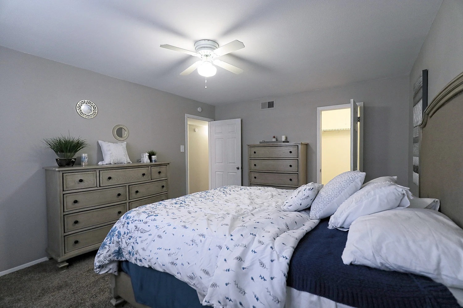 8100 North Mopac Expressway, Unit 9145 Austin, TX 78759 - Photo 27 of 28 a bedroom with a bed and a dresser