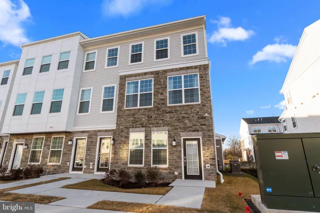 a front view of a building with windows