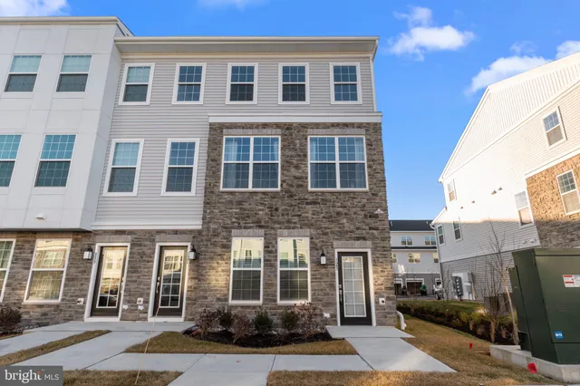 a front view of a building with a street