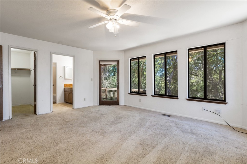 7905 San Gregorio Road Atascadero, CA 93422 - Photo 12 of 40 Primary bedroom with walk-in closet and en-suite bathroom.