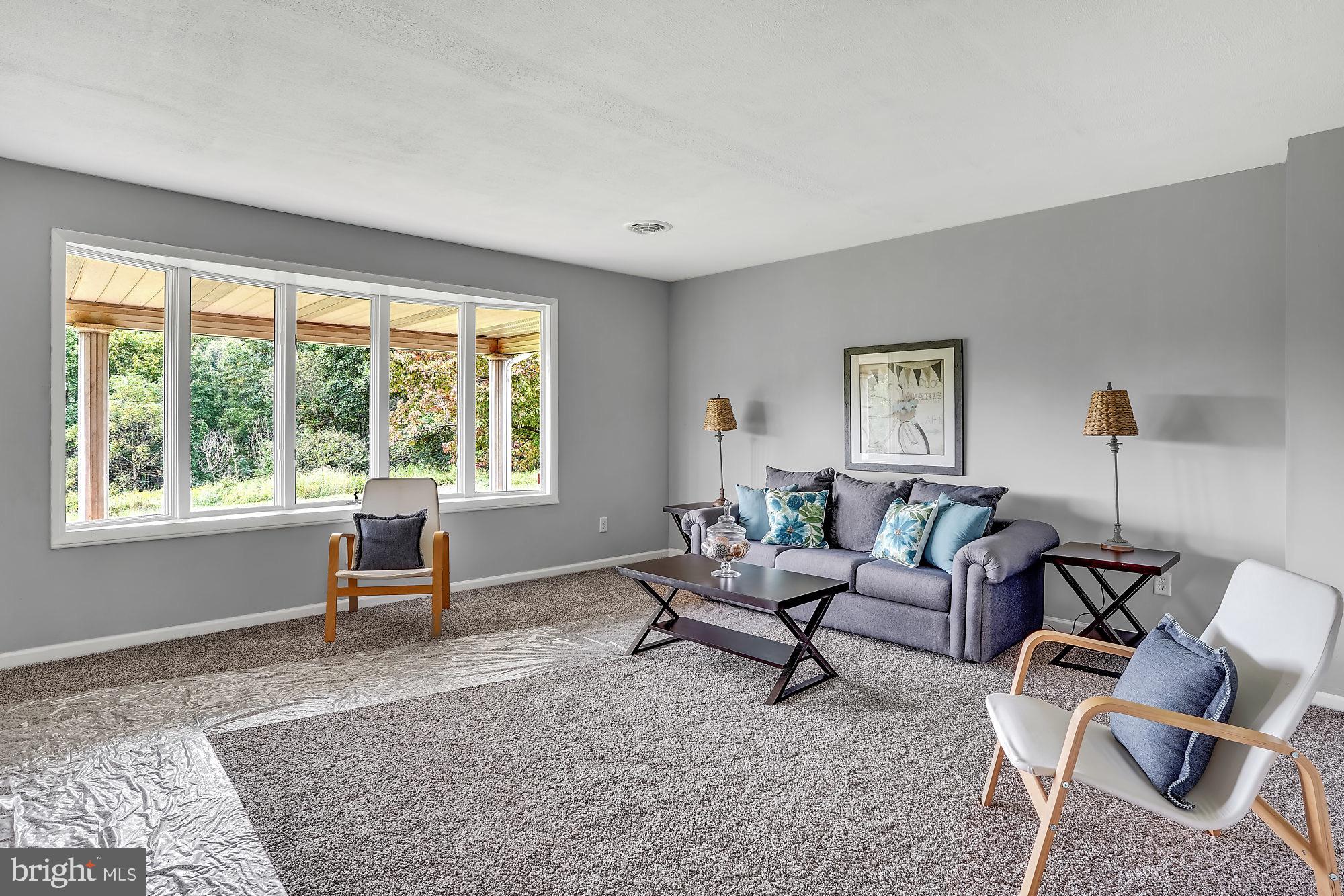 13296 Fishel Road Felton, PA 17322 - Photo 2 of 51 a living room with furniture and a window