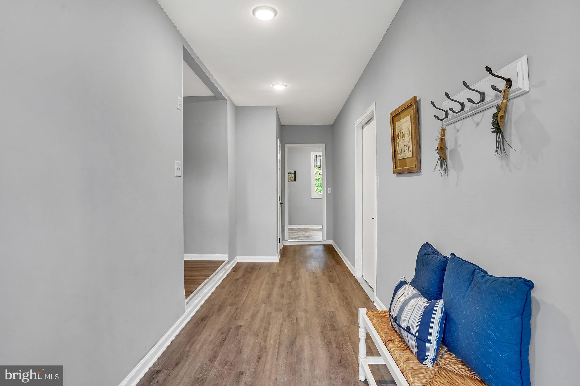 13296 Fishel Road Felton, PA 17322 - Photo 15 of 51 a view of a hallway with wooden floor