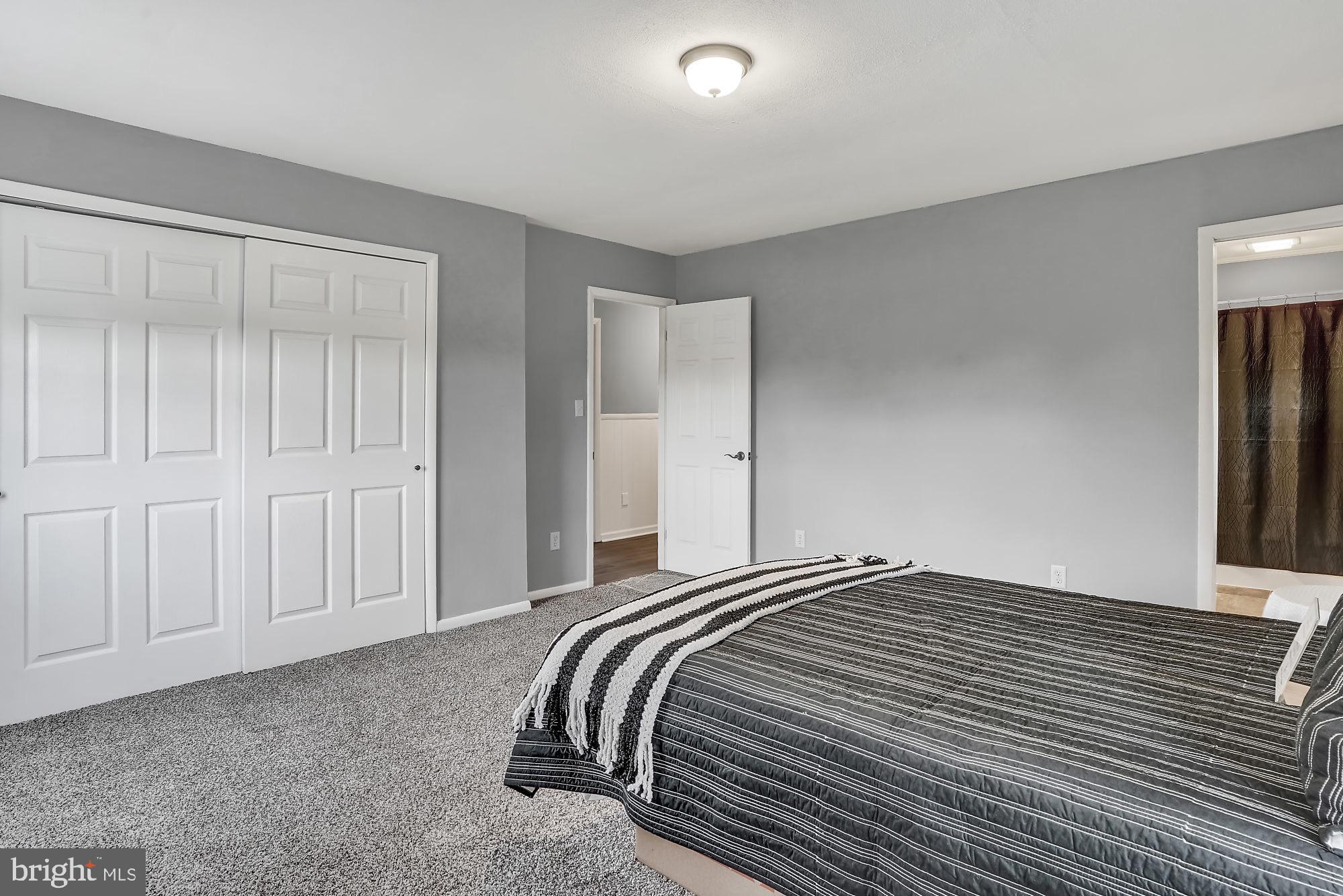 13296 Fishel Road Felton, PA 17322 - Photo 17 of 51 a bedroom with a bed and a window