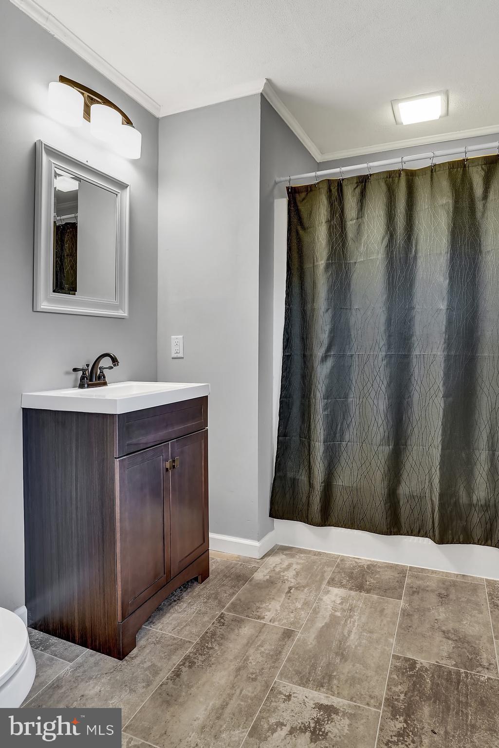13296 Fishel Road Felton, PA 17322 - Photo 18 of 51 a bathroom with a sink and a mirror