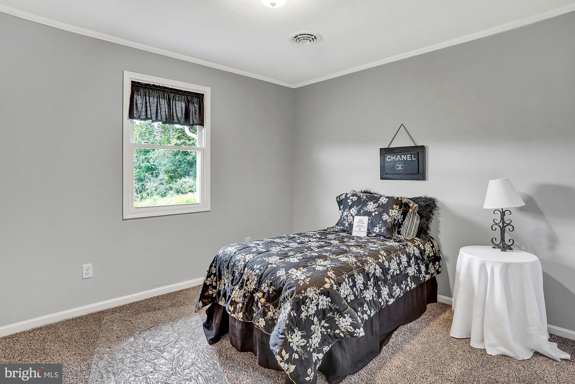13296 Fishel Road Felton, PA 17322 - Photo 21 of 51 a bedroom with a bed and a window