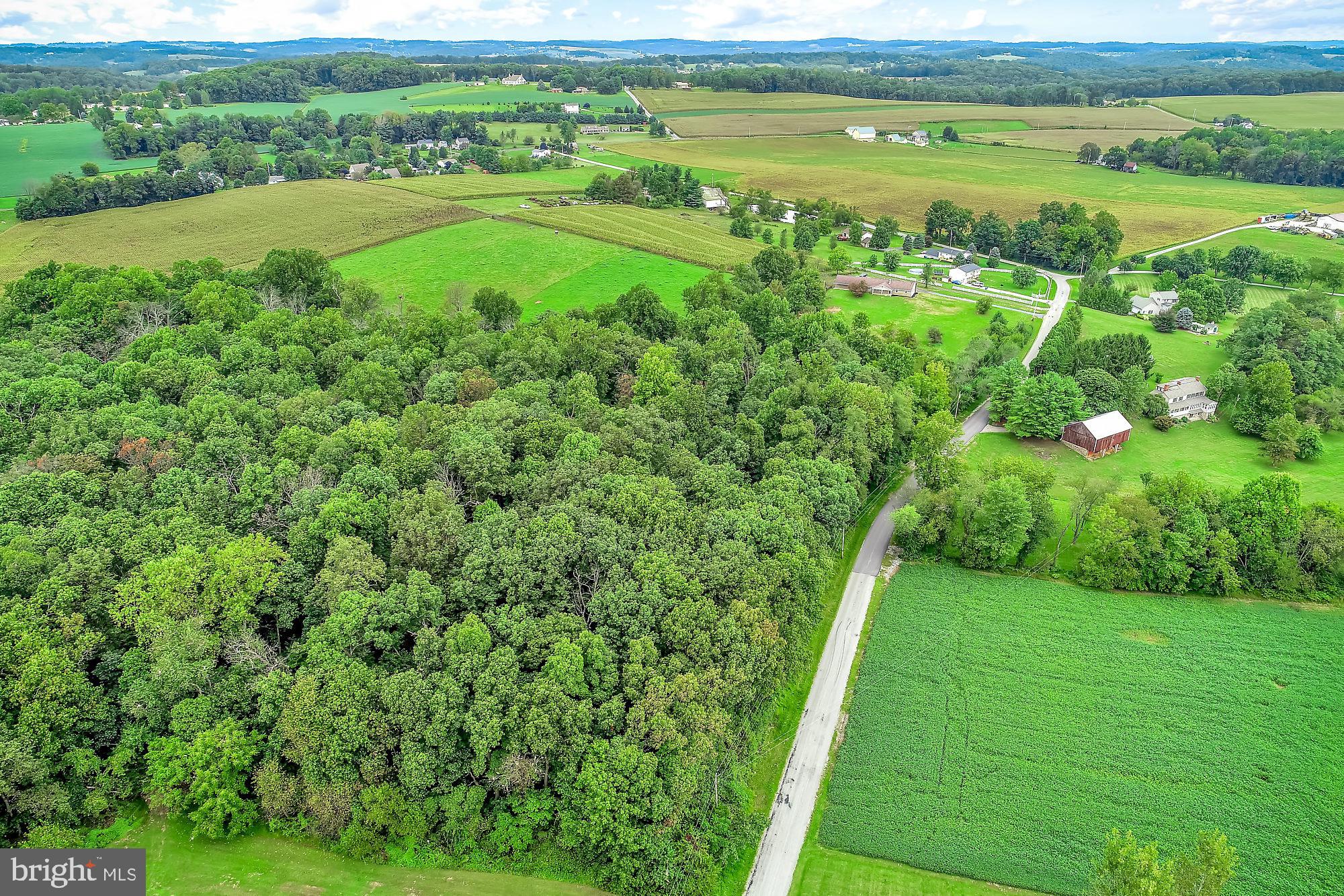13296 Fishel Road Felton, PA 17322 - Photo 38 of 51 a view of a field with an ocean