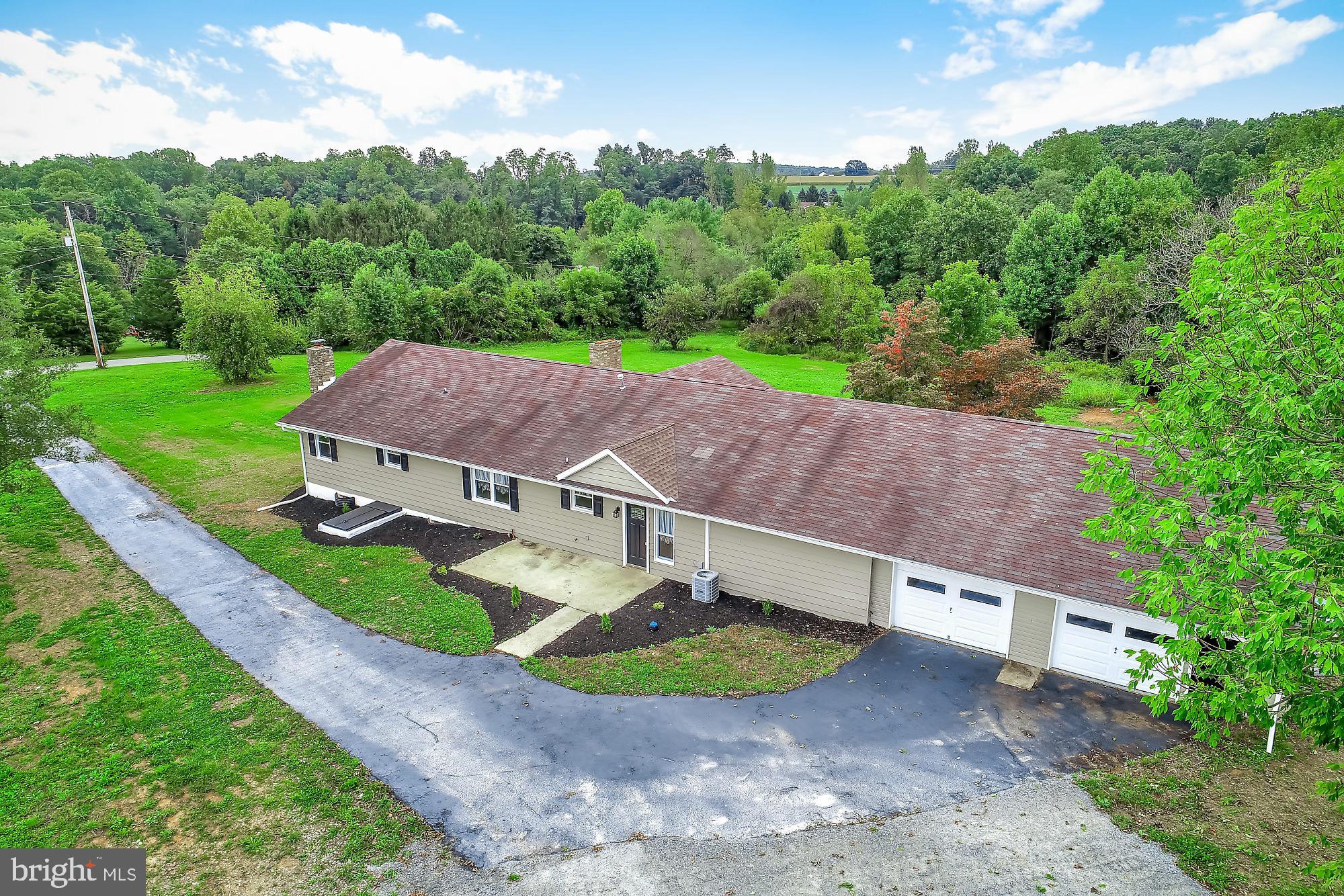 13296 Fishel Road Felton, PA 17322 - Photo 45 of 51 an aerial view of a house with garden