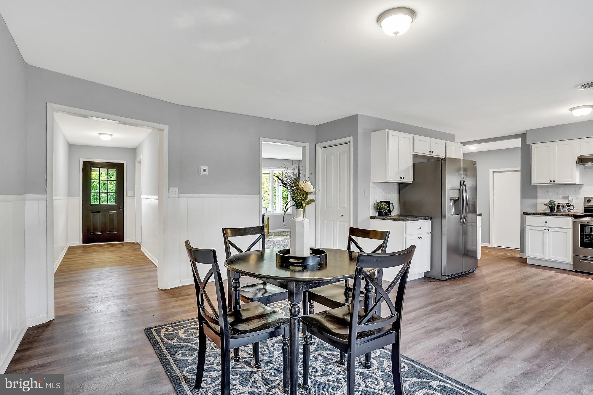 13296 Fishel Road Felton, PA 17322 - Photo 6 of 51 a view of a dining room with furniture and wooden floor