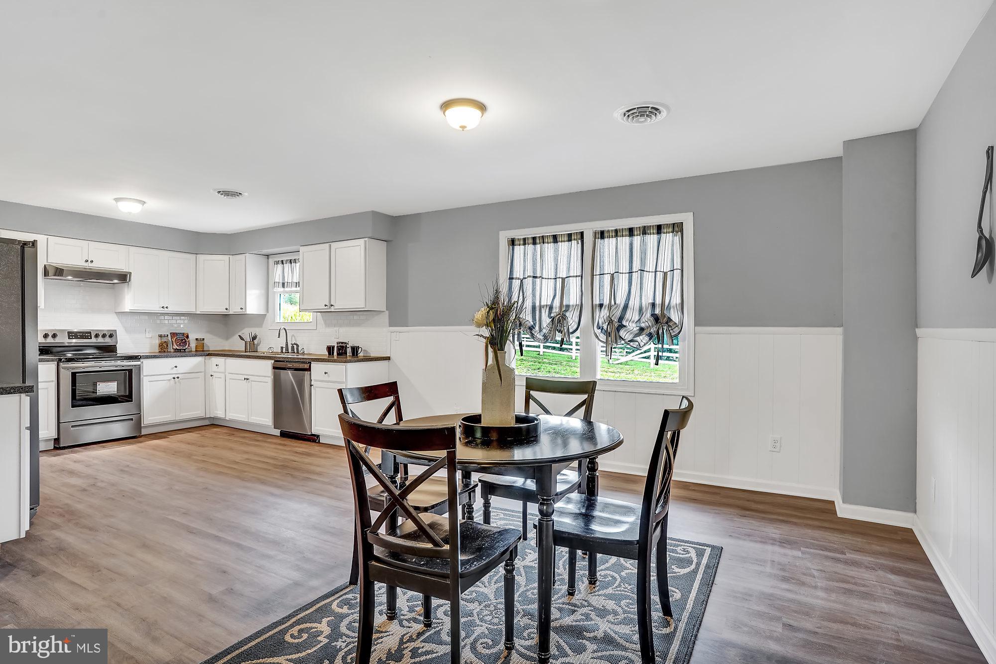 13296 Fishel Road Felton, PA 17322 - Photo 8 of 51 a view of a dining room with furniture and wooden floor