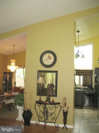 806 Malta Lane Silver Spring, MD 20901 - Photo 2 of 30 a view of a living room with a table and chairs