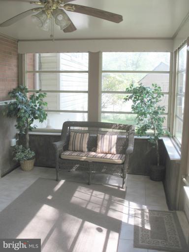 806 Malta Lane Silver Spring, MD 20901 - Photo 13 of 30 a living room with furniture and a large window