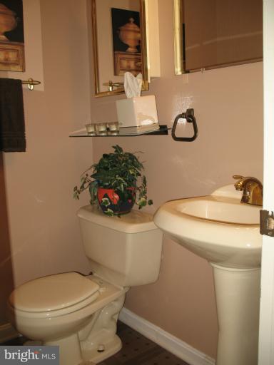 806 Malta Lane Silver Spring, MD 20901 - Photo 26 of 30 a bathroom with a toilet and a sink