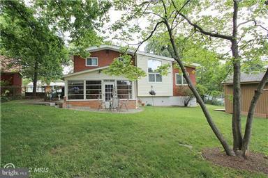 806 Malta Lane Silver Spring, MD 20901 - Photo 8 of 30 a view of a house with a backyard