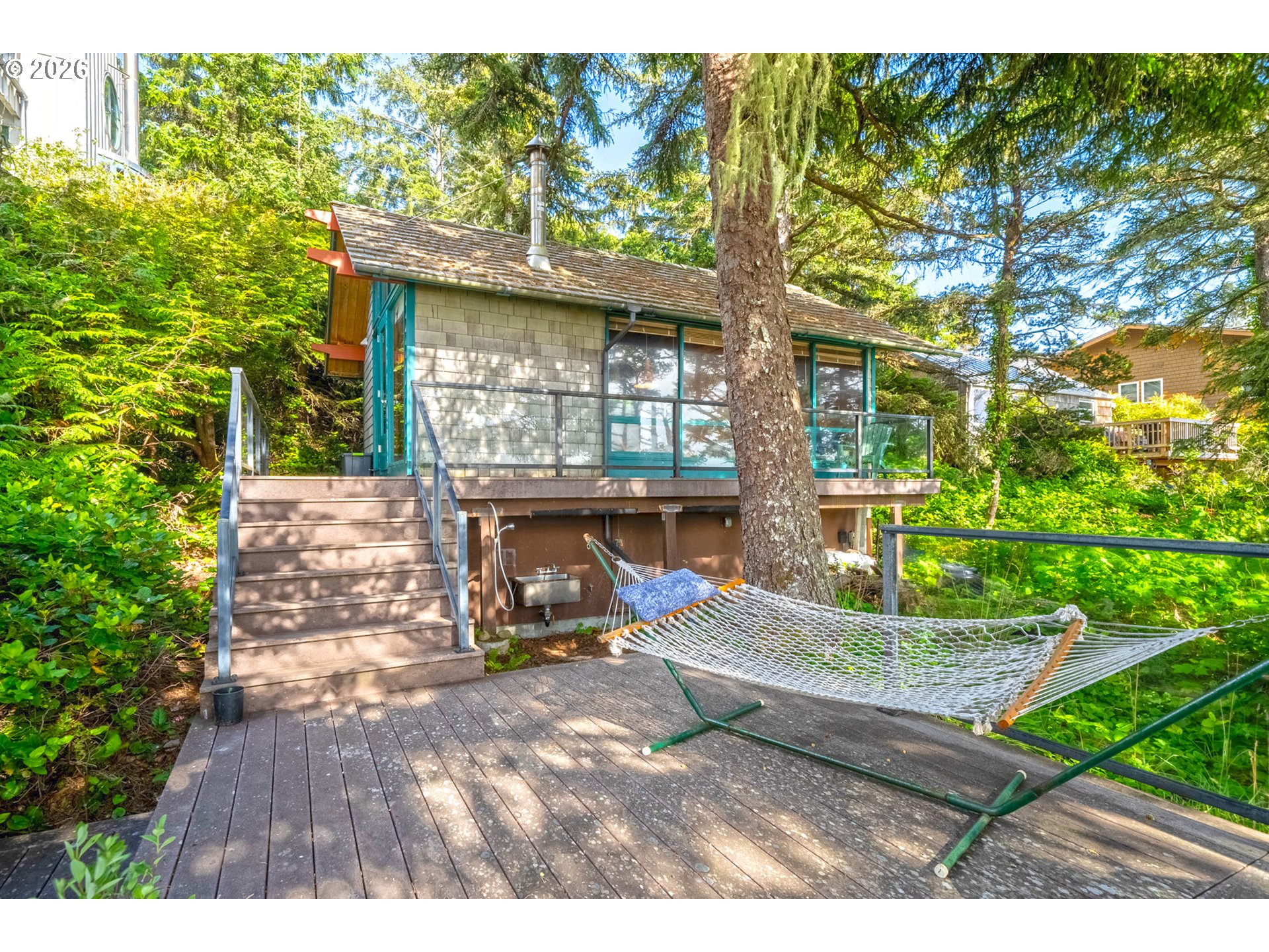 1560 Pearl Street West Netarts, OR 97141 - Photo 1 of 44 a view of yard with an outdoor seating