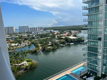 a view of a lake from a balcony