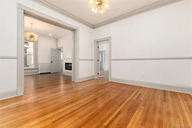 a view of a livingroom with wooden floor