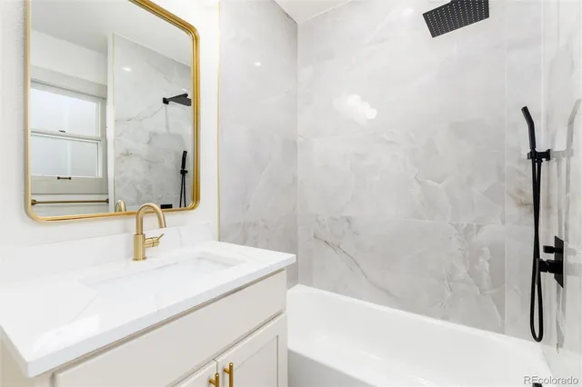 a bathroom with a sink and a tub