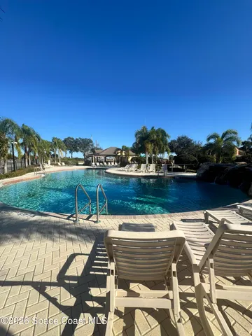 a view of an ocean and a mountain