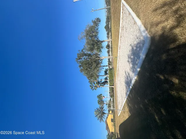 a view of kitchen island with wooden floor