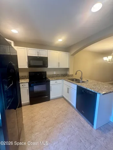 a bathroom with a sink a toilet and a bathtub