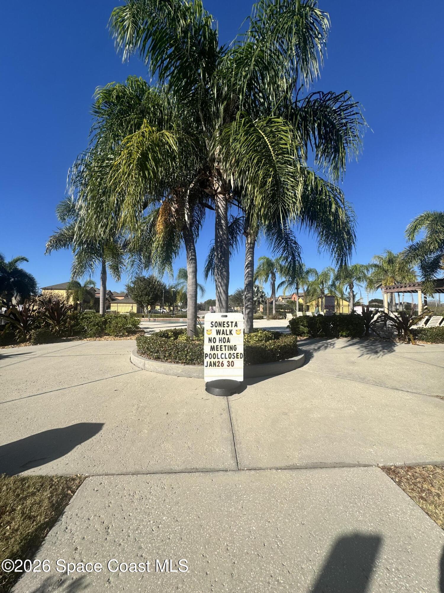 4575 Radiant Way, Unit 102 Melbourne, FL 32901 - Photo 7 of 73 a view of outdoor space with swimming pool and lounge chair