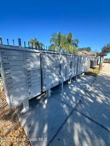 a view of a pathway with a yard