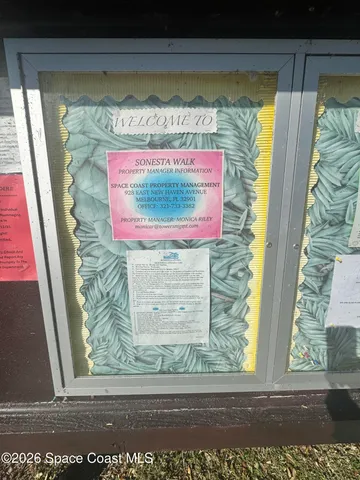 a view of swimming pool with outdoor seating and plants