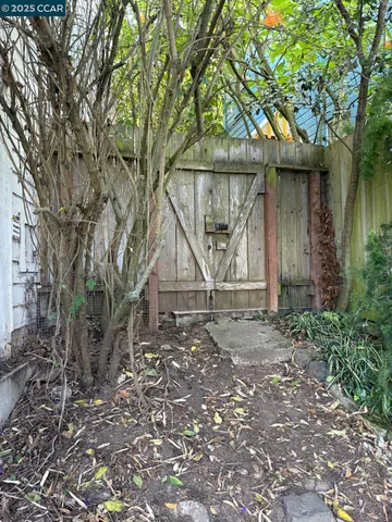 a view of a balcony with wooden floor