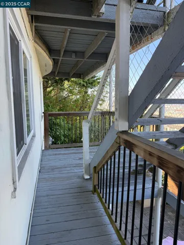 a view of a city street with tall buildings