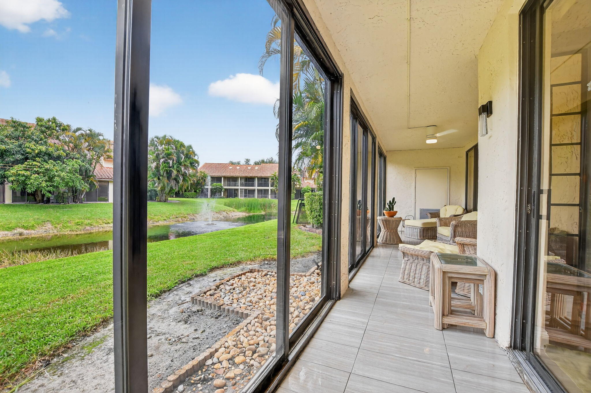 7773 La Mirada Drive Boca Raton, FL 33433 - Photo 30 of 39 Enclosed patio