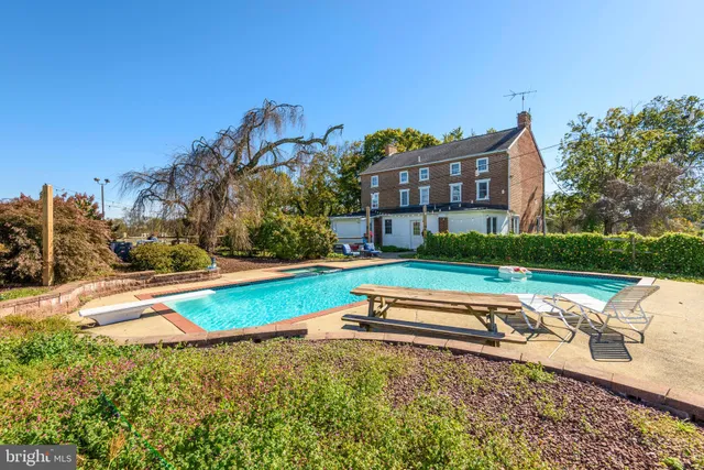 a view of a hallway with seating area