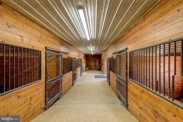 a living room with furniture fireplace and flat screen tv