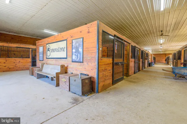 a view of a balcony with furniture