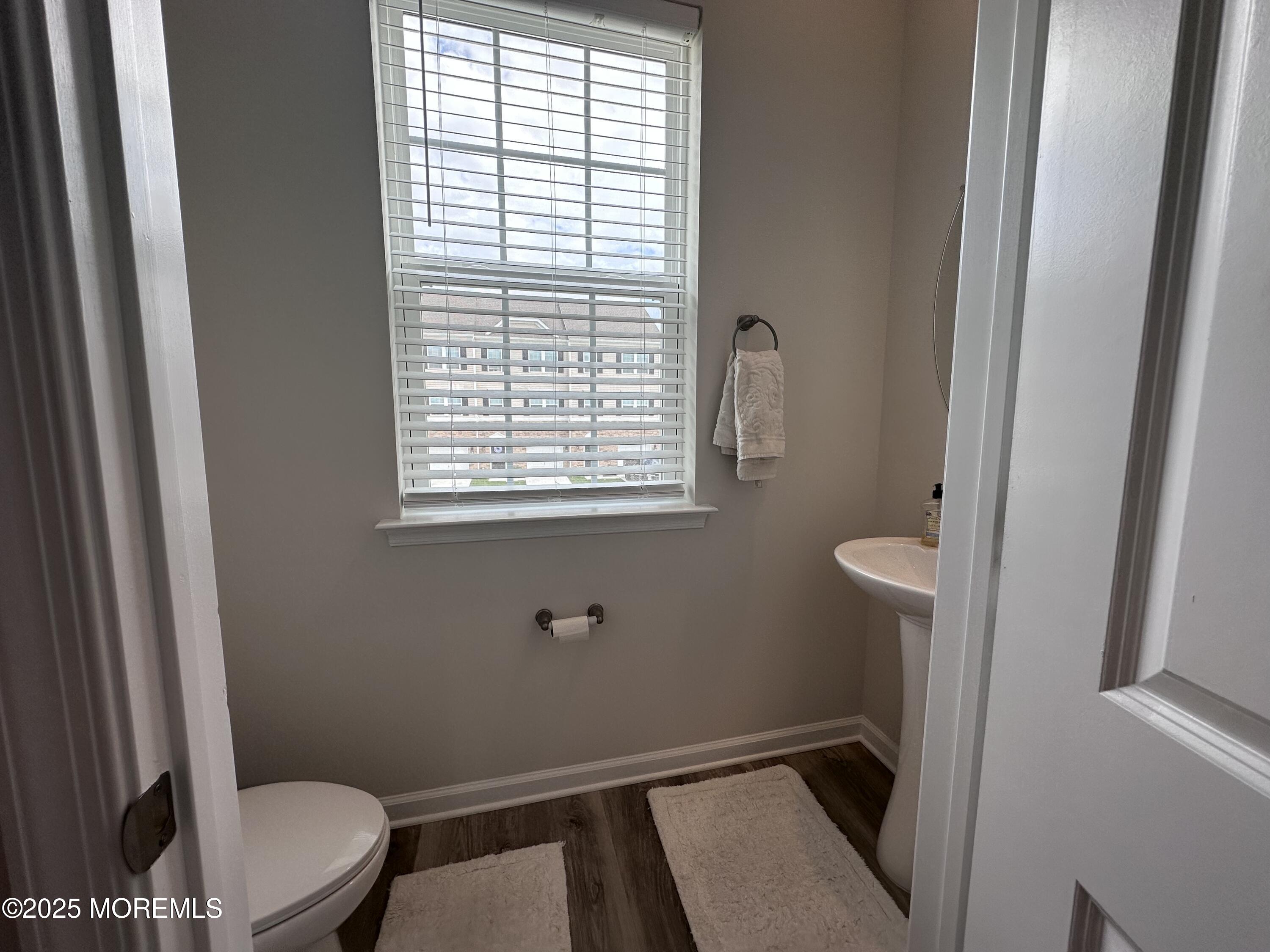 248 Macoun Way Glassboro, NJ 08028 - Photo 14 of 18 a bathroom with a window a toilet and a sink