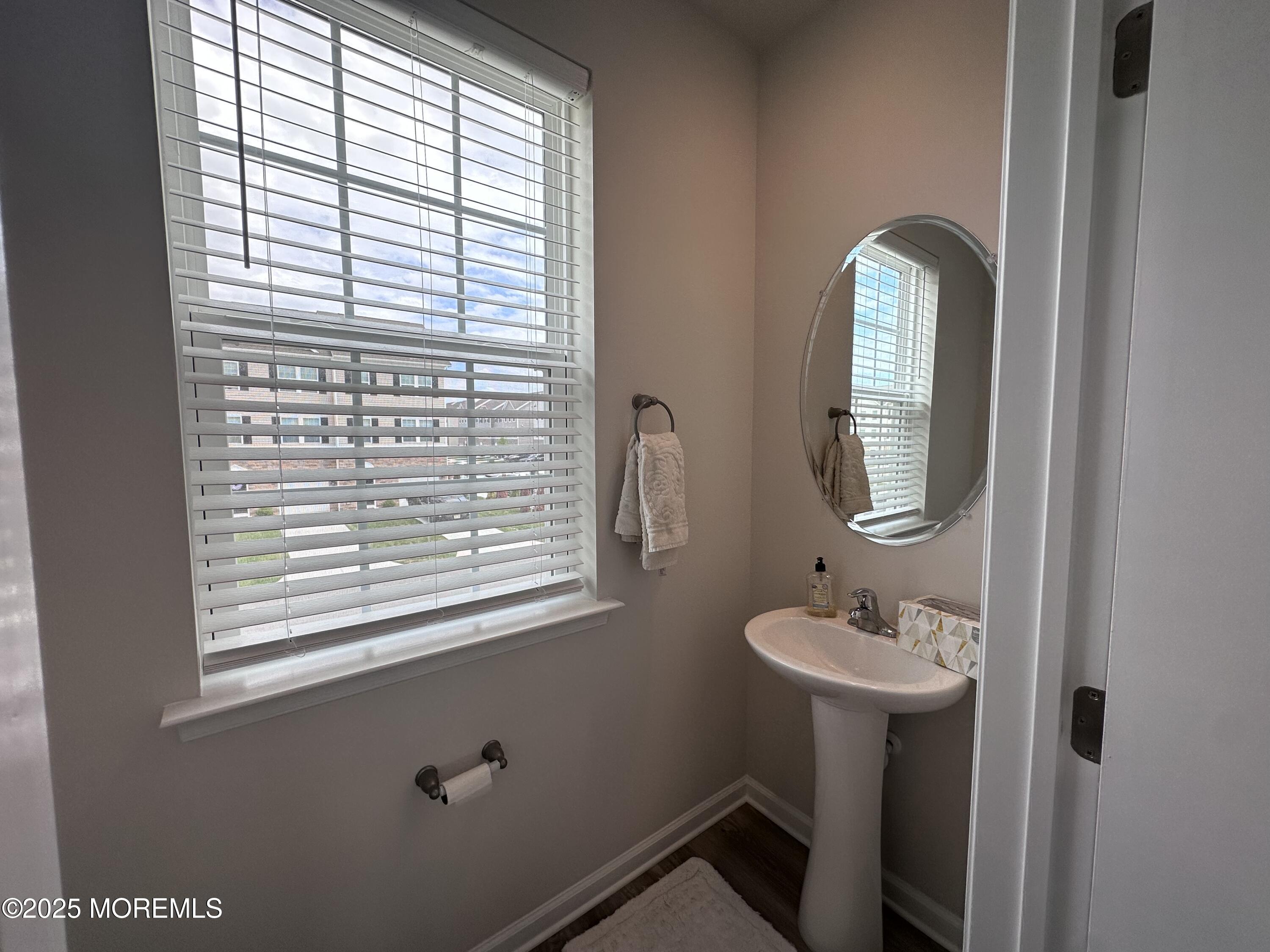 248 Macoun Way Glassboro, NJ 08028 - Photo 15 of 18 a bathroom with a sink and a mirror