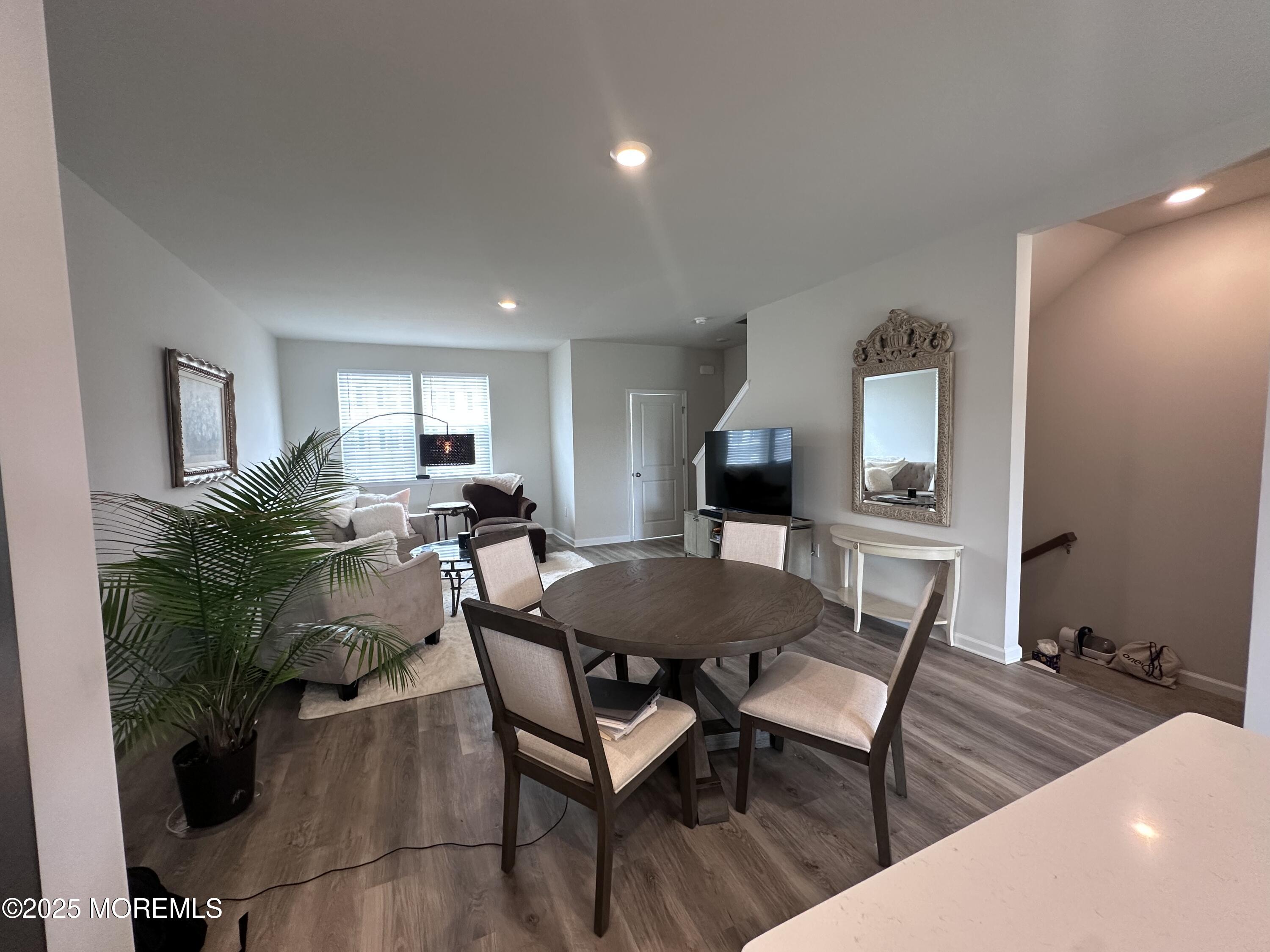248 Macoun Way Glassboro, NJ 08028 - Photo 5 of 18 a view of a dining room with furniture and wooden floor