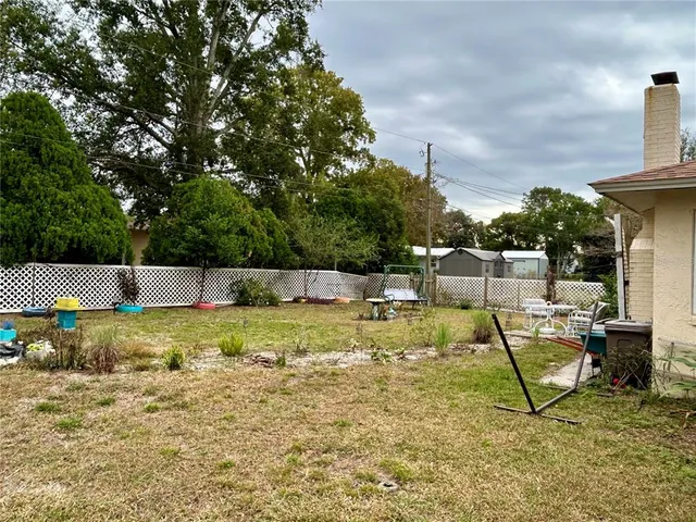 a view of a garden with a slide