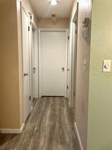 a view of a bathroom with a shower and a sink