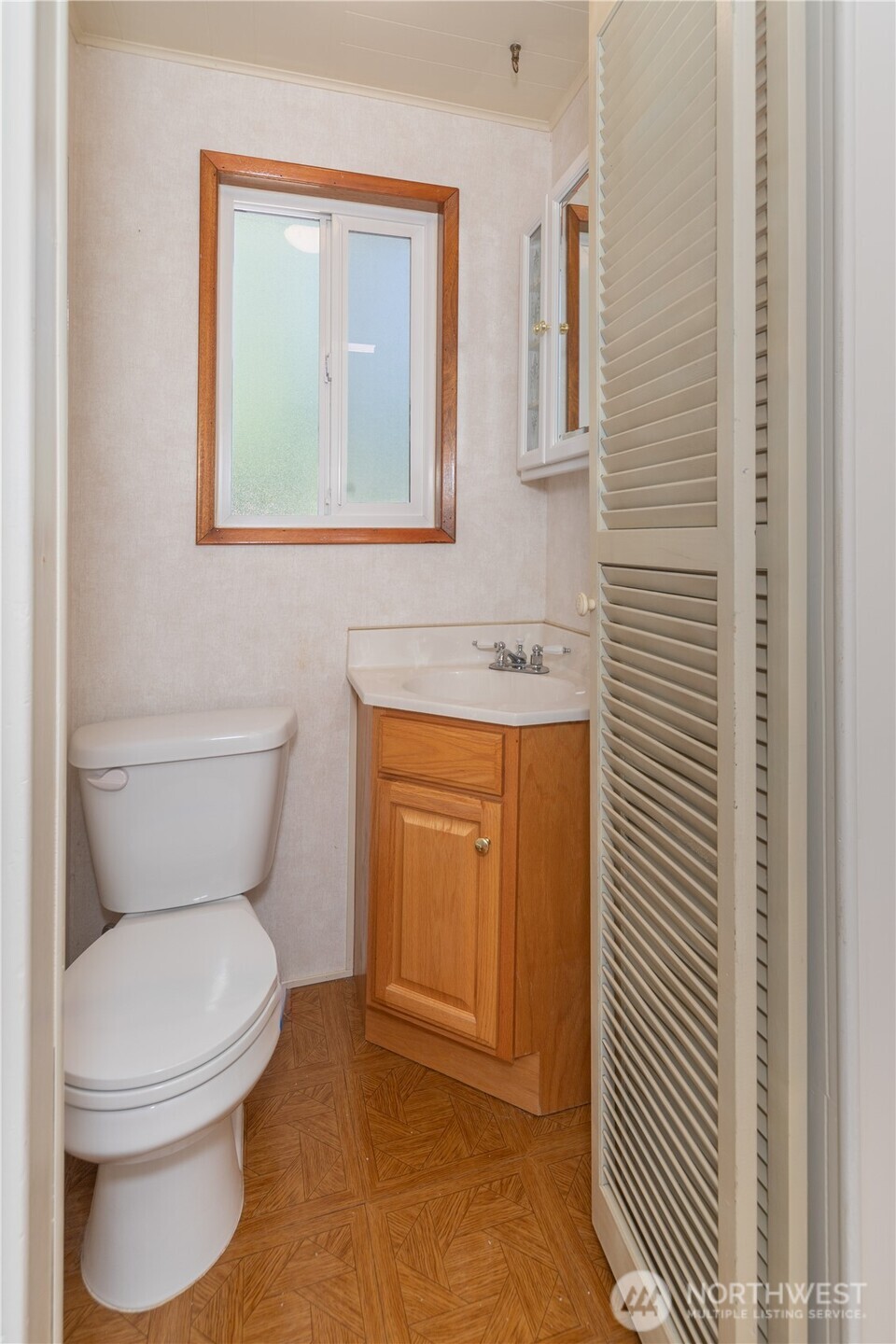 245 Gupster Road Sequim, WA 98382 - Photo 15 of 40 a bathroom with a toilet and a sink