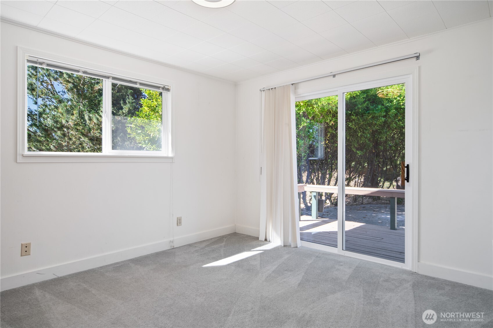 245 Gupster Road Sequim, WA 98382 - Photo 20 of 40 an empty room with windows
