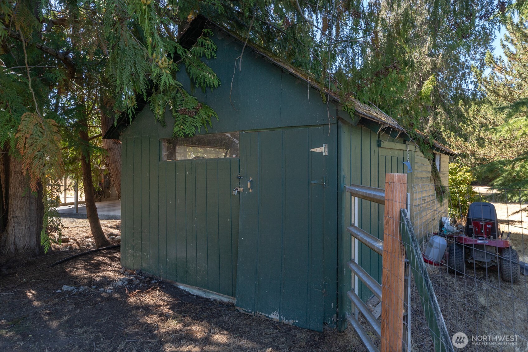245 Gupster Road Sequim, WA 98382 - Photo 34 of 40 a backyard of a house with seating space