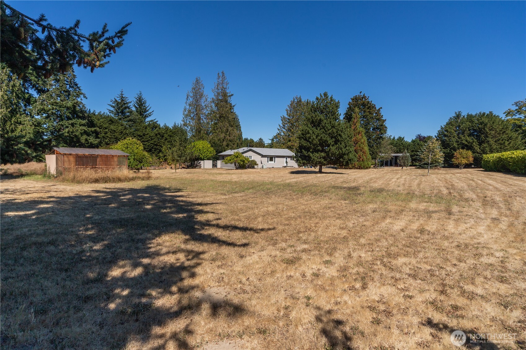 245 Gupster Road Sequim, WA 98382 - Photo 38 of 40 a view of empty room with tree s