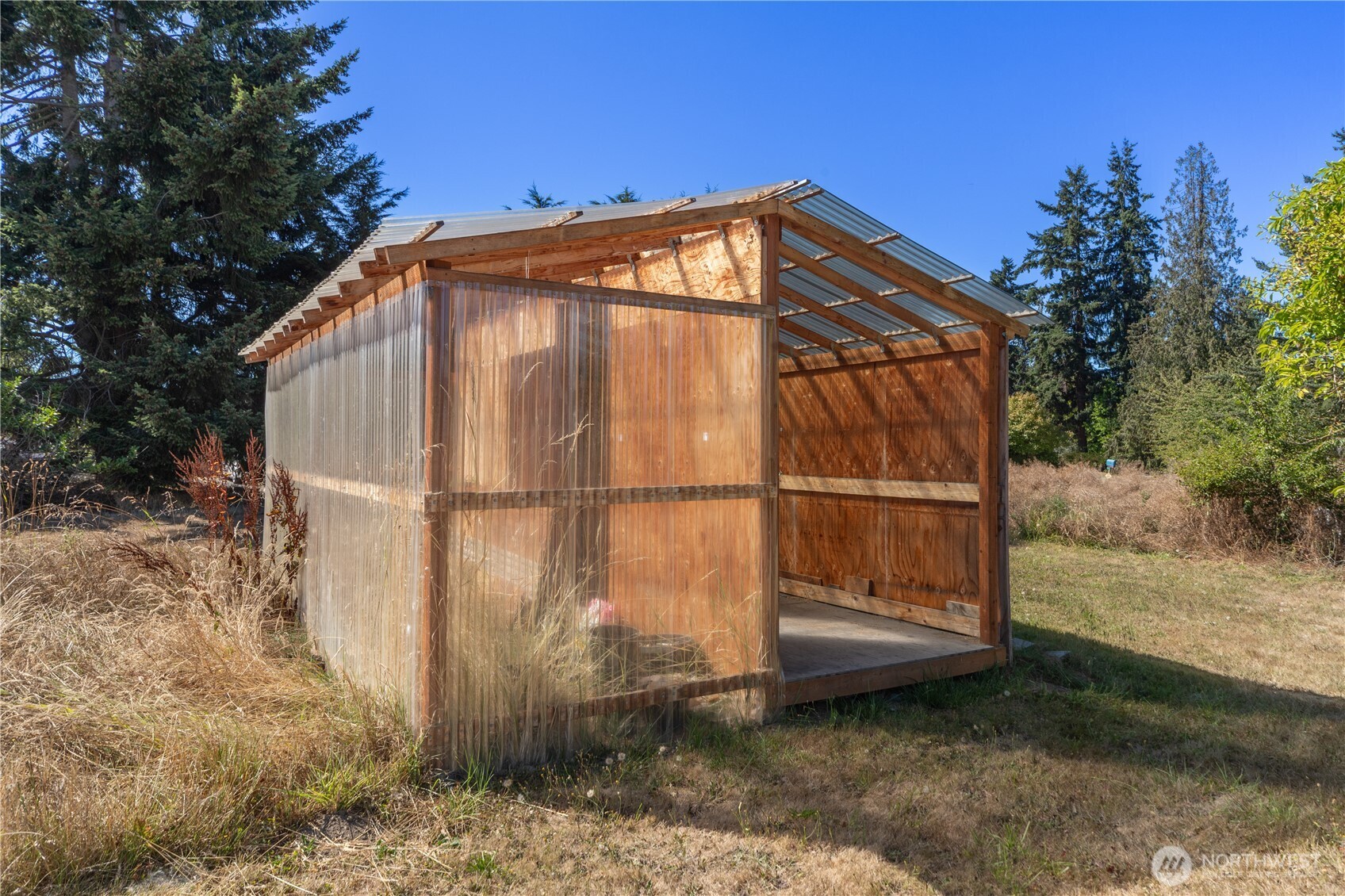 245 Gupster Road Sequim, WA 98382 - Photo 39 of 40 a backyard of a house