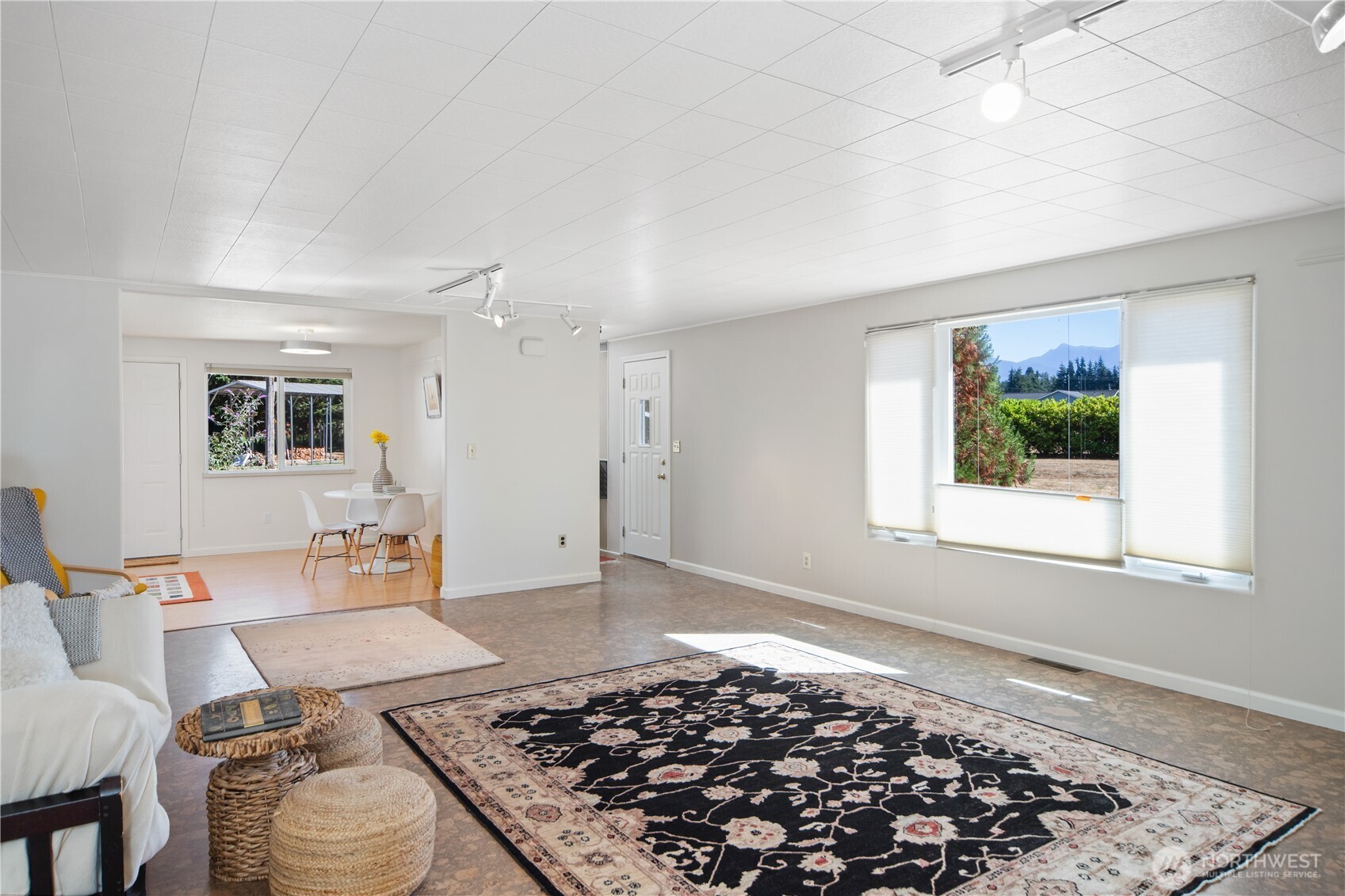 245 Gupster Road Sequim, WA 98382 - Photo 6 of 40 a living room with a couch and a window
