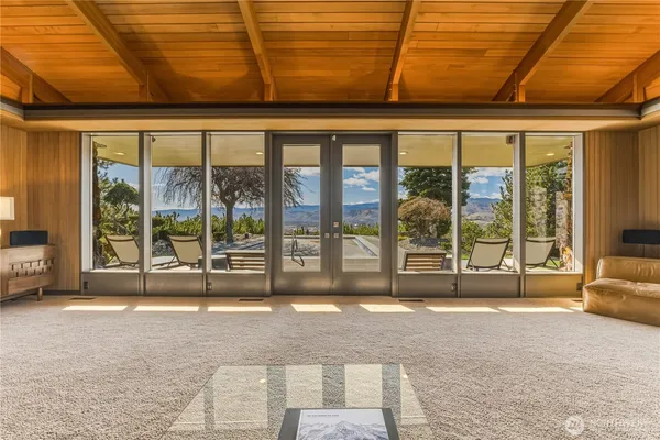a bathroom with granite countertop a sink and a stove
