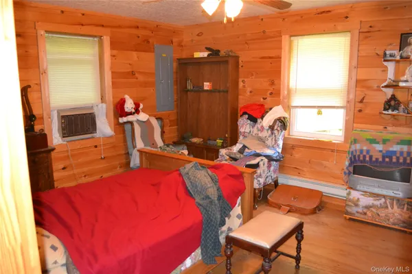 a view of a room with chairs and a table